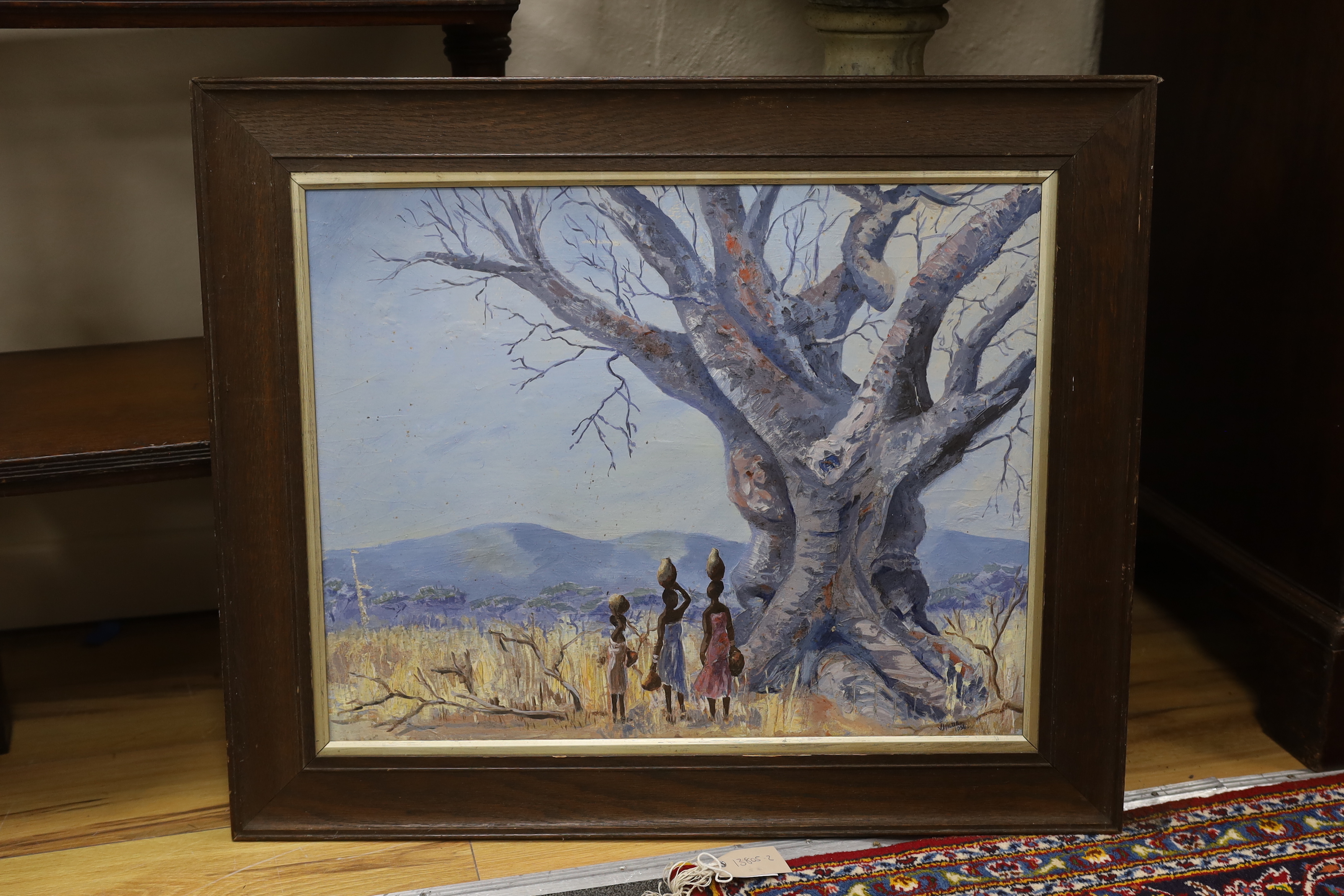 J Wilde, oil on board, African landscape with three figures, signed and dated 1964, 47 x 59cm